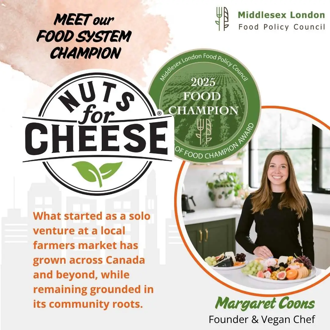 Promotional graphic featuring Nuts For Cheese founder pictured in a kitchen, with Food System Champion recognition and brand logo.